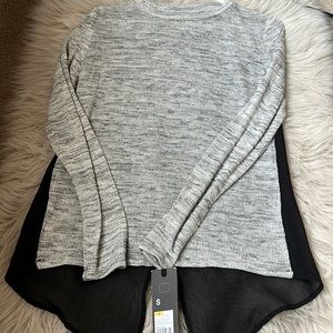Women’s sweater top with sheer back